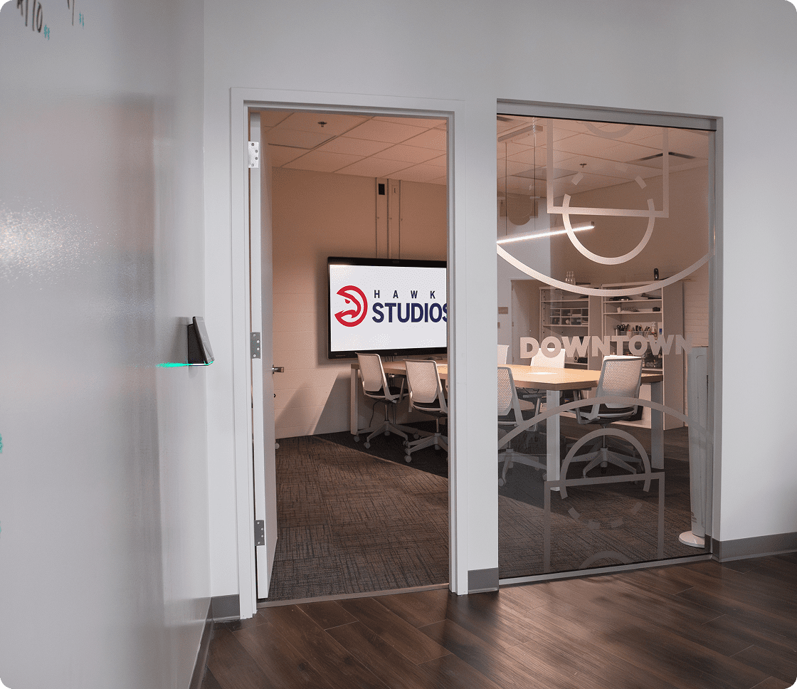 Modern conference room with glass walls.